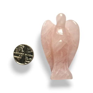 Rose quartz angel crystal 5cm, size shown with a 5p coin
