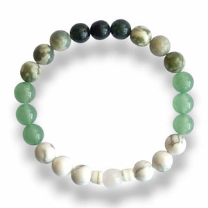 Handmade green gradient beaded bracelet with seashell spacers on stretch cord, 7.5 inch