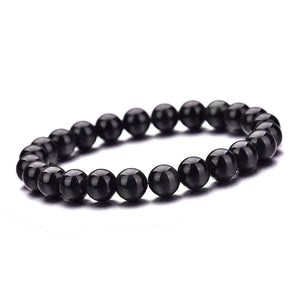 Black Obsidian Bracelet featuring smooth, round beads for a stylish accessory.