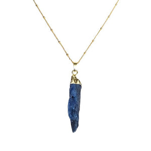 Lapis Lazuli Pendant Necklace featuring a gold chain and a striking blue stone.