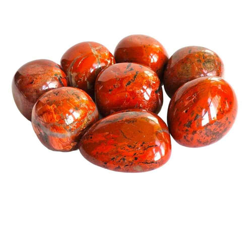 Red jasper polished tumblestone in brick-red natural stone