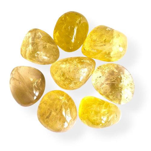 Citrine polished tumblestone in warm golden natural stone