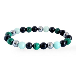 Malachite and black stone bracelet featuring shiny silver accents and a mix of green and black beads.
