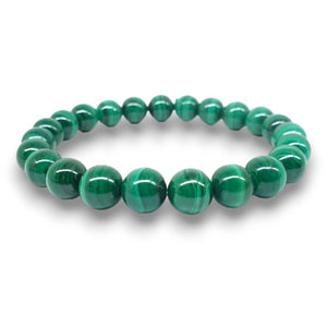 Green Malachite Bracelet featuring smooth, round beads for a stylish accessory.