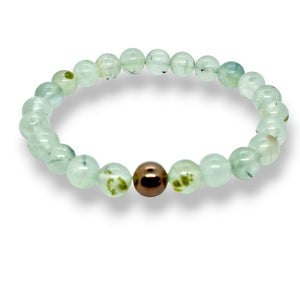 Aqua gemstone bracelet featuring translucent beads and a metallic accent.
