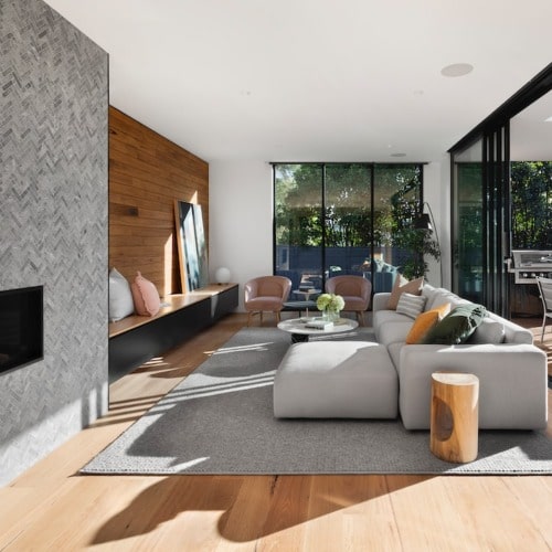 Modern Living Room Sofa Set with Gray Fabric and Stylish Decor.