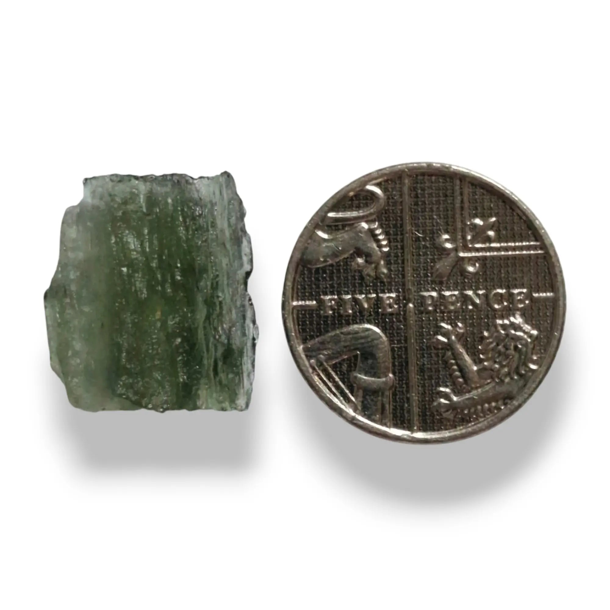 Raw moldavite close to coin for size reference, exact stone pictured