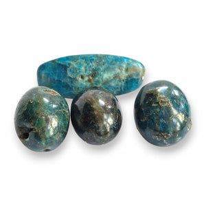 Hand-polished Blue Apatite tumblestone, vivid ocean-blue natural stone with dark matrix