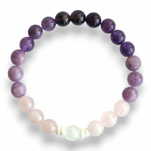 Handmade purple beaded bracelet with shell slice spacers on stretch cord, 7.5 inch