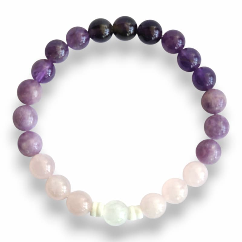 Handmade purple beaded bracelet with shell slice spacers on stretch cord, 7.5 inch