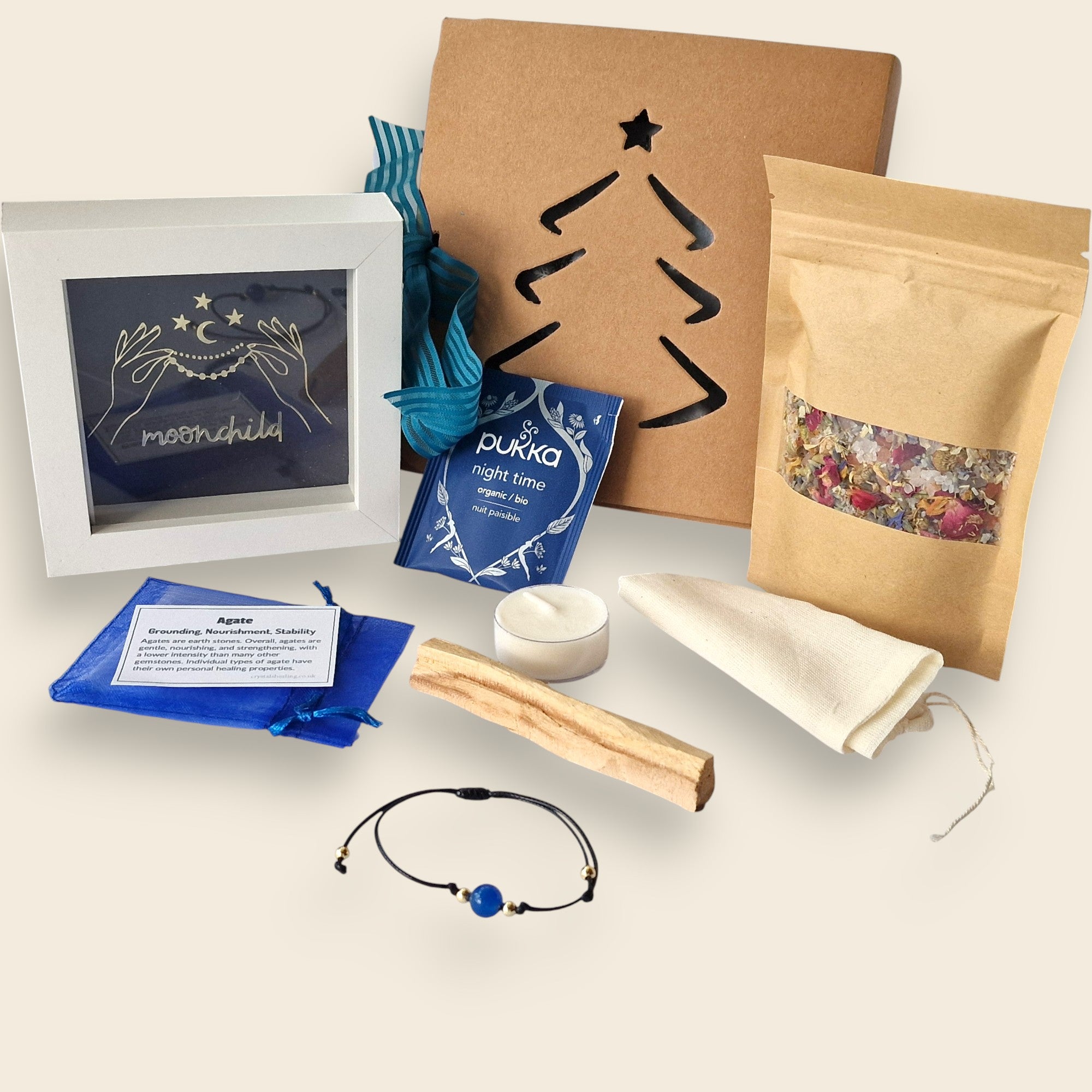 Moonchild | Blue Agate
Tea: Pukka Night Time
Botanicals: Calendula flowers, Lavender buds, Blue cornflower petals, Rose petals, Chamomile flowers
Framed message: “Moonchild”