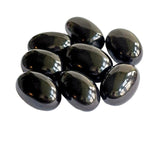 Black Obsidian Stones, smooth and glossy, ideal for healing and meditation.