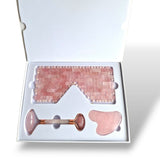 Rose Quartz Facial Roller and Eye Mask set in a white box